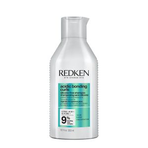 Redken Acidic Bonding Curls - Възстановяващ шампоан  за третирани и увредени къдрави коси.. 300 ml